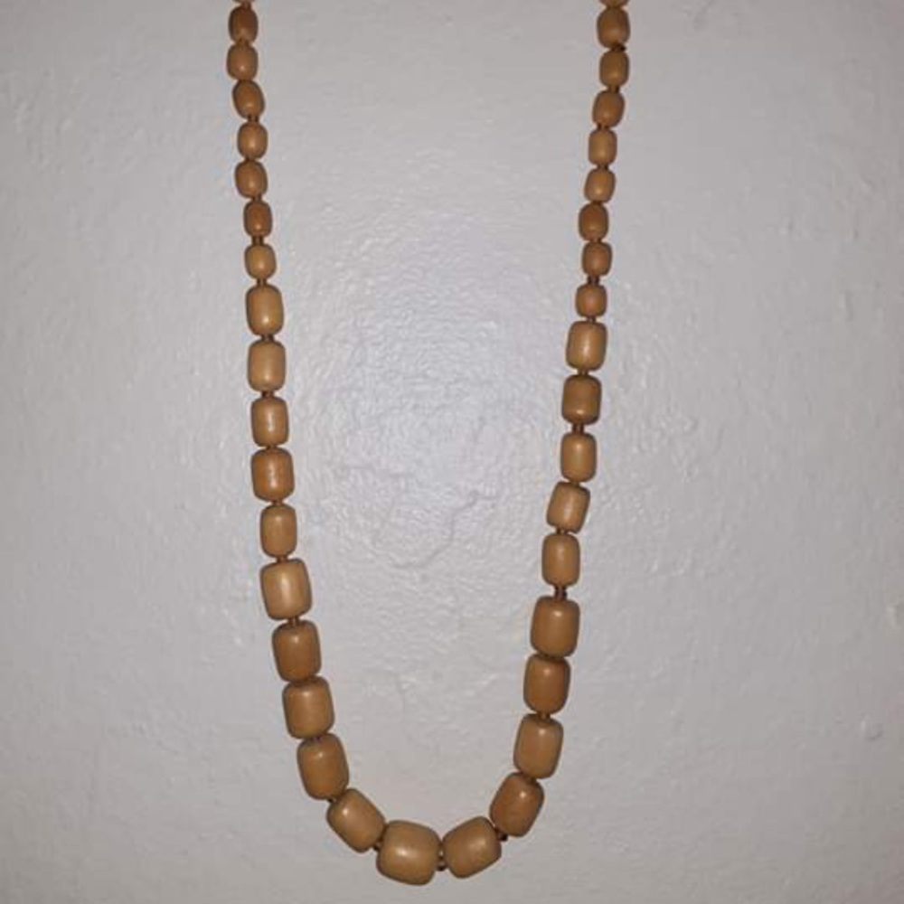 Set of three wooden and plastic beaded necklaces